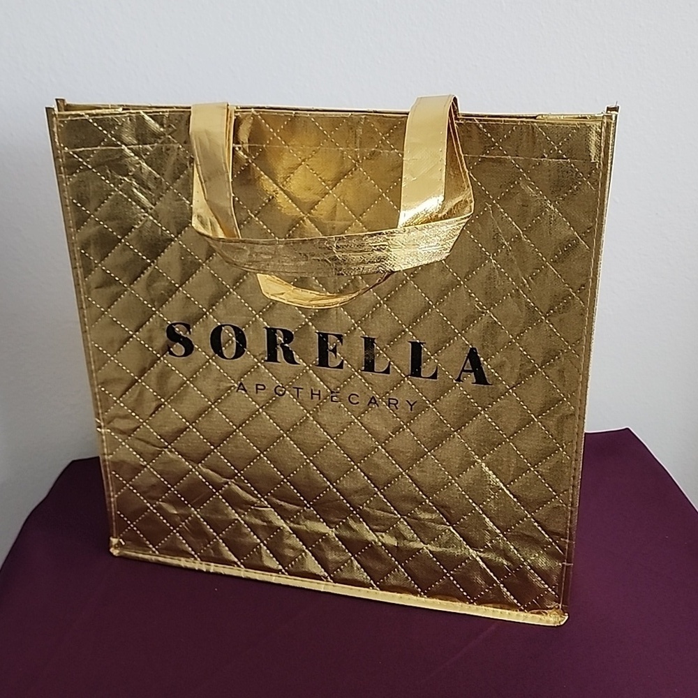 Sorella Apothecary Nylon Tote Bag Gold with a Diamond Pattern.